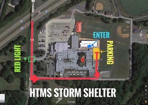Enter at the baseball road entrance, park in the tennis parking lot and follow signate to enter the storm shelter at the back